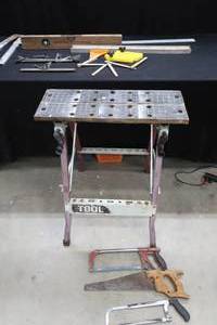 lot 97 image: LEVELS, SQUARES, SAWS AND EVEN A METAL TOOL BENCH.