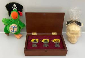 lot 46 image: Vintage Disney Pirates Of The Caribbean The Legend Lives On Pin Set (NIB) & More