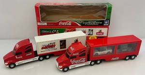 lot 77 image: Misc. COCA-COLA Collectible Semis (NIB)