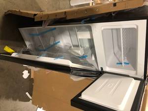 lot 1 image: Magic Chef 7.3 cu. ft. 2-Door Mini Fridge in Black with Freezer Customer Returns See Pictures