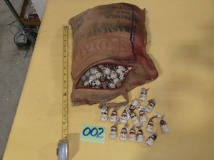 lot 2 image: Bag of Little Ceramic Snowmen with Names