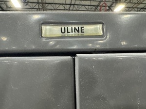 lot 38 image: Uline Two Door Cabinet