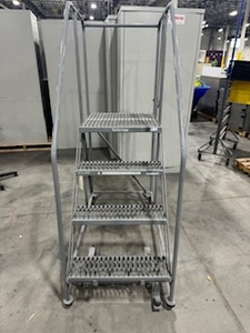 lot 68 image: Cotterman Four Step Rolling Ladder with Break. Platform Height 40