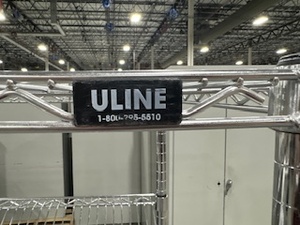 lot 88 image: Uline Slanted Wire Shelving