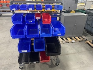 lot 104 image: Akro Mills Two-Sided Rolling Bin Cart with 30 Various Sized Bins
