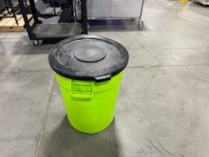 lot 135 image: Uline 32 Gallon Hi-Vis Green Trash Can with Lid