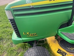 lot 5 image: John Deere Riding Lawn Mower, Runs Rough need mechanics touch