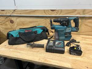lot 75 image: MAKITA Hammerdrill with HEPA Filter, Battery, Charger and Bag