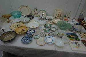 Variety of decorative plates and bowls, saucers and a vintage glass orange juice pitcher