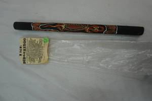 The Didgeridoo (made in Australia) Piece of art or musical instrument, (missing wax)
