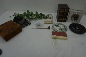 Napkin holder, fake grapes, photo albums, and more