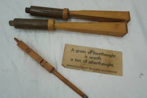 Bird calls, wood pipe and sign