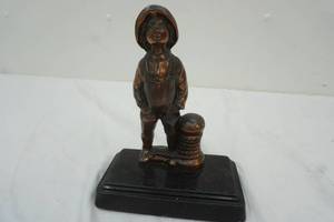 Metal Statue with copper finish of a fisher boy 8 tall