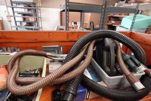 lot 205 image: Assorted Tools - Pipe Snake, Shop Vac Hoses, Solder