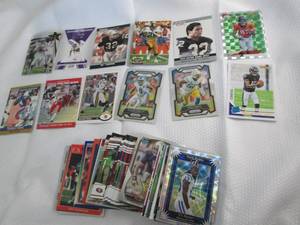 65 Assorted Football cards...