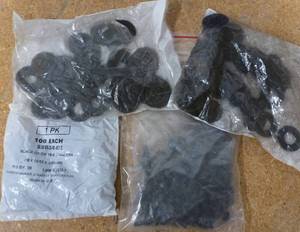 Bin with hundreds of washers, lock nuts, cap screws
