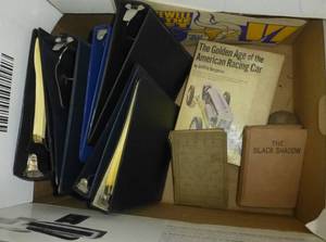Box with 3 ring binders, some books and picnic basket
