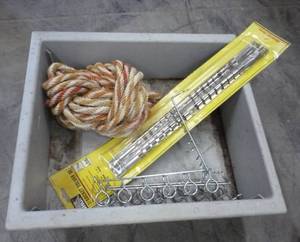 Bin with garage items, socket hangers, rope