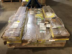 lot 25 image: 8 Boxes of TrafficMaster Grey Oak 7 mm T x 8 in. W Laminate Wood Flooring (23.9 sqftcase) Customer Returns See Pictures