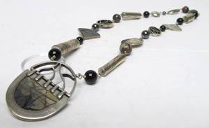 lot 11 image: Modernist Picasso Stone Sterling Silver Pendant Necklace