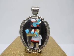 lot 22 image: Signed Vintage Southwestern Zuni Sterling Silver Inlaid Pendant by Bev Etsate