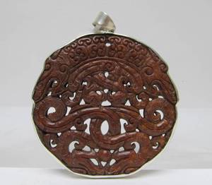 lot 26 image: Larger Sterling Silver JadeHardstone Oriental Dragon Pendant