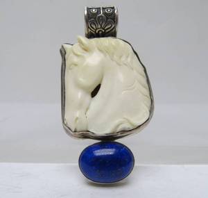 lot 38 image: Larger Signed Sterling Silver Carved Bone & Lapis Horse Pendant