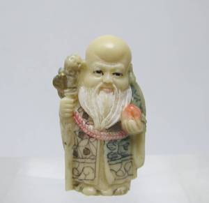 lot 51 image: Carved Bone & Sterling Silver Chinese Elder Pendant