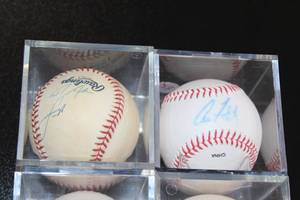 lot 181 image: Minnesota Twins Autograph Baseball Lot  4 Autographed Baseballs In Cubes  Eric Milton - Mike Ryan - Chad Allen - Aaron Fultz