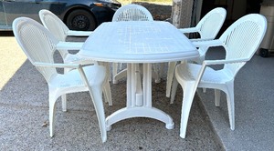 lot 14 image: White Resin Table with 6 Chairs