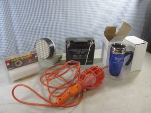 lot 14 image: (BS) Universal 12V Battery AGM Type Has Juice, 12V Work Light and Other Misc