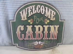 lot 87 image: (EC1) Welcome To Our Cabin Tin Sign 15 12 x 14 34