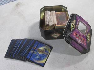 lot 105 image: (EC1) Yu-Gi-Oh Cards in Tin with a Few Duel Masters Cards
