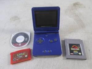 lot 113 image: (EC1) Nintendo Game Boy Advance SP and a Couple Games