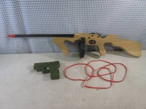 lot 265 image: (H-2) Wood Rubber Band Shooting Gun with Ruber Bands and Other Toy Gun with Shooting Sound
