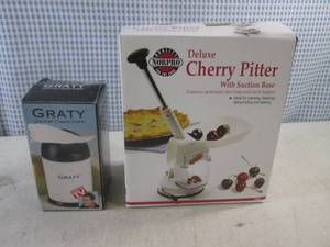 lot 284 image: (BSB) Cherry Pitter and Cheese Grater with Boxes