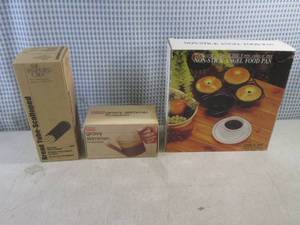 lot 285 image: (BSB) Pampered Chef Bread Tube-Scalloped, Gravy Skimmer and Non-Stick Angel Food Pan