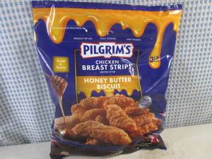lot 335 image: (FRZ) 3 Pound Bag Frozen Chicken Breast Strips Fritter Style Honey Butter Biscuit Flavor Past Date