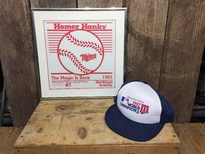 lot 131 image: Framed 1991 MN Twins Homer Hanky  1987 WC Cap