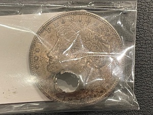 lot 47 image: 1921 Morgan Dollar with Bullet Hole