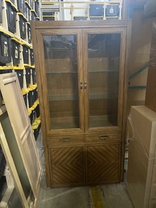 lot 1C-128 image: Wood and Glass Hutch with Light and Drawer