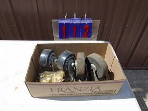 Flat of casters. As shown.