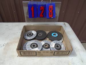 flat of 4 - 4 12 grinding wheels. As shown.