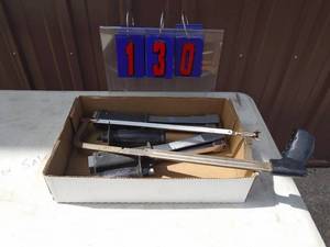 Flat with tack hammer & saw. As shown.