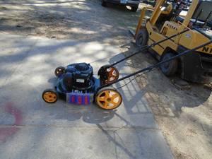 Poulan pro 500e push mower. Used condition. Tested & works. As shown.