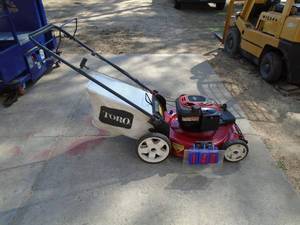 Toro recylcler self propelled lawn mower with bag. Used condition. Tested & works. As shown.