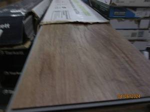 lot 10 image: 2 packages of builders choice spc flooring system color is pueblo 28.84 sqft per package oak spiceies open box