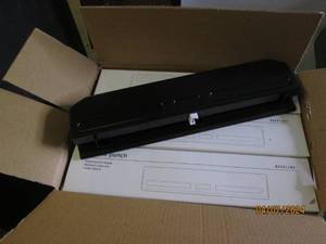 lot 36 image: case of 12 3 hole punches...
