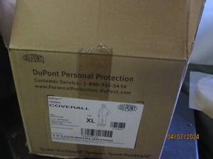 lot 75 image: case of dupont xl coveralls...