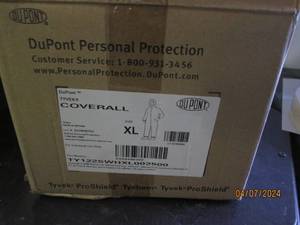 lot 78 image: case of dupont xl coveralls...